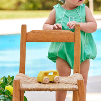 Little English traditional children's clothing. Green twill bubble with white piping for baby boy for Spring