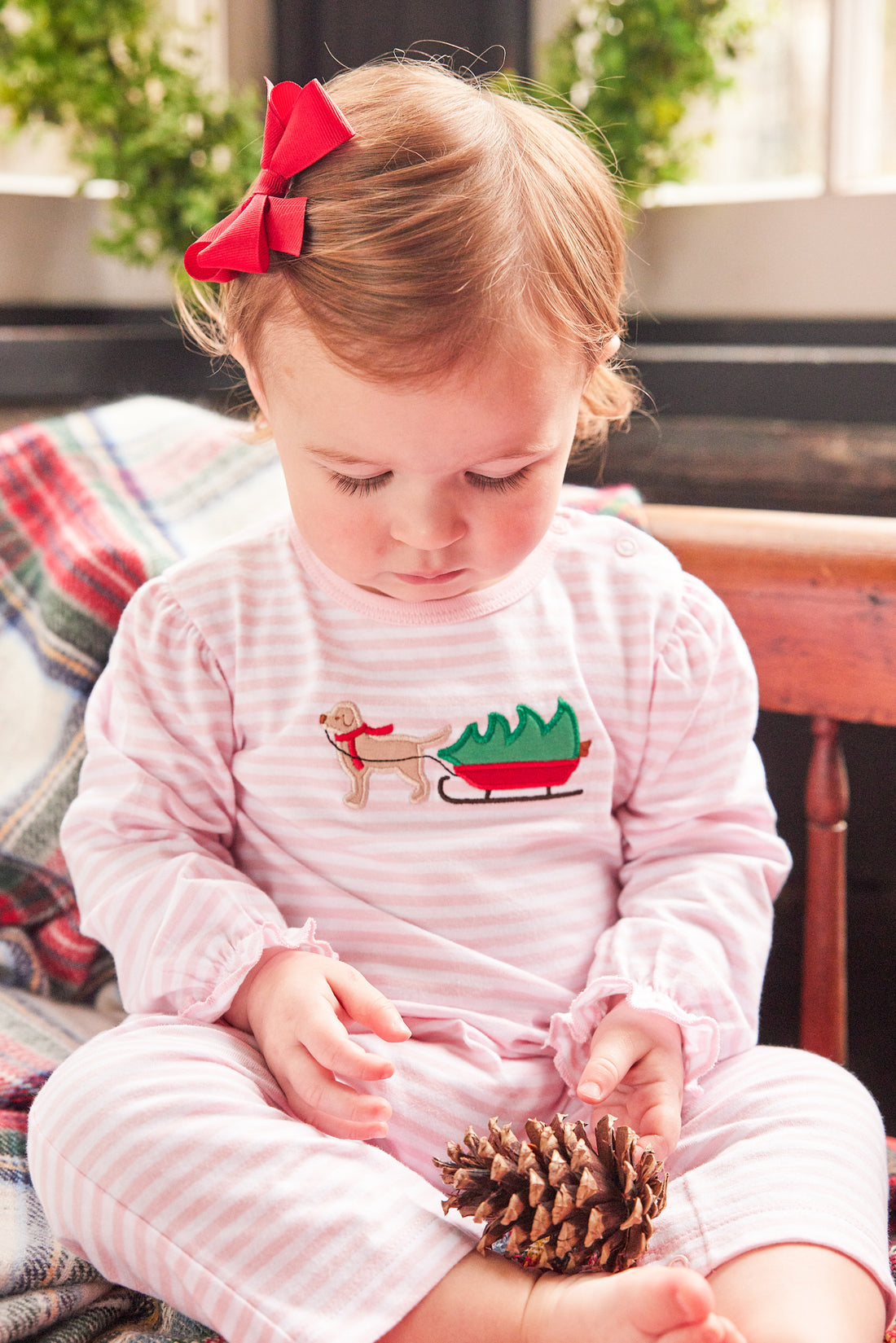 Little English traditional clothing, light pink and white stripe knit romper with ruffled sleeves and holiday lab applique on chest for little girl