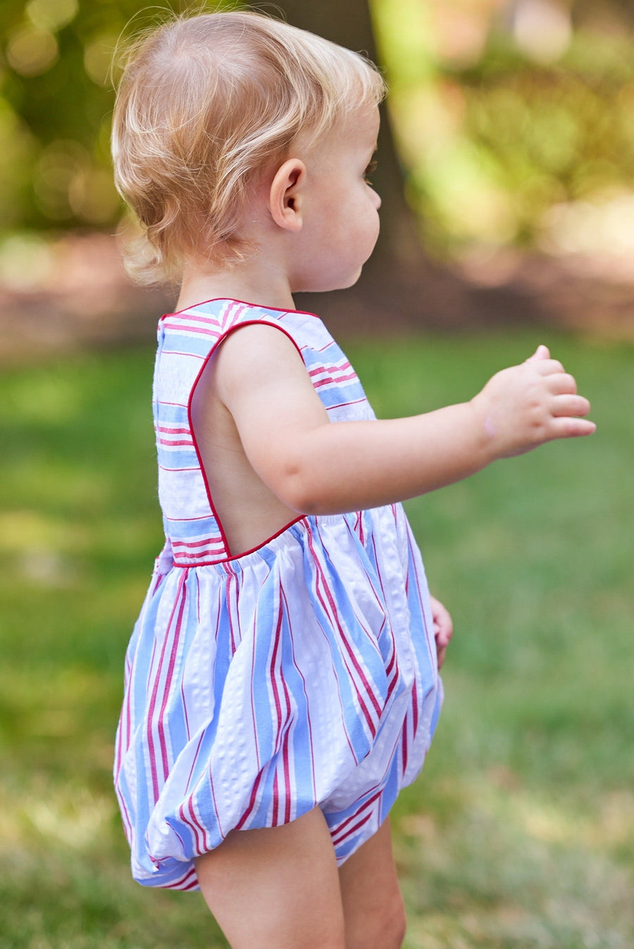 Little English traditional children's clothing.  Boy's red, white and blue seersucker stripe bubble for spring