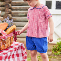 Little English traditional children's clothing.  Red and white gingham peter pan shirt and coordinating royal blue corduroy shorts.  Back to school outfit for little boys for Fall.