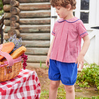 Little English traditional children's clothing.  Red and white gingham peter pan shirt and coordinating royal blue corduroy shorts.  Back to school outfit for little boys for Fall.