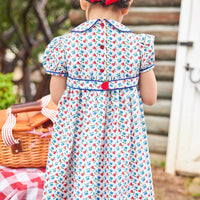 Little English traditional children's clothing. Sweet blue and red pear print peter pan dress for little girl. Adorable back to school outfit for Fall.