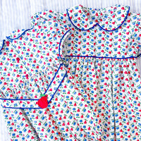 Little English traditional children's clothing. Sweet blue and red pear print peter pan bubble for baby girl. Adorable back to school outfit for Fall.