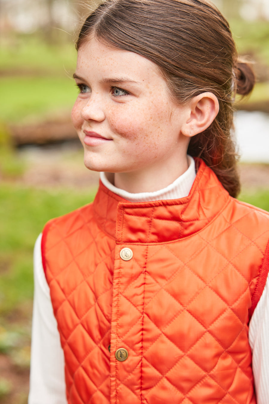 Little English traditional children's clothing. Unisex quilted orange vest for Fall