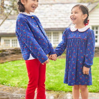 Little English girl's flared red knit leggings for fall