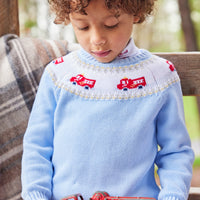 Little English traditional children's clothing. Boy light blue fair isle sweater with fire trucks for Fall