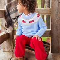 Little English traditional children's clothing. Boy light blue fair isle sweater with fire trucks for Fall