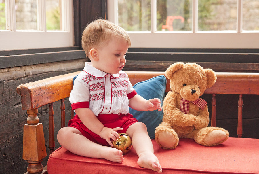 Little English traditional children's clothing, Graham Short Set with red bottoms and collared white top, smocked detailing on chest and buttons around hips, for little boy