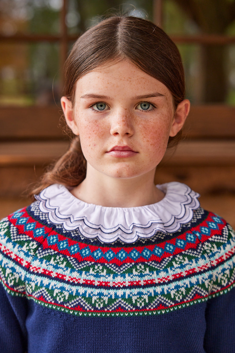 Little English traditional children's clothing.  White knit long sleeve shirt with double ruffle collar trimmed in navy for girls for Fall