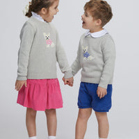 Little English traditional children's clothing. Gray intarsia sweater with frenchie dog motif for little girl, Gray intarsia sweater with frenchie dog motif for little boy, Jillian skirt in hot pink corduroy, banded short in royal blue corduroy, long sleeve hastings polo in  white, piped peter pan shirt in white, for fall