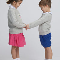 Little English traditional children's clothing. Gray intarsia sweater with frenchie dog motif for little girl, Gray intarsia sweater with frenchie dog motif for little boy, Jillian skirt in hot pink corduroy, banded short in royal blue corduroy, long sleeve hastings polo in  white, piped peter pan shirt in white, for fall