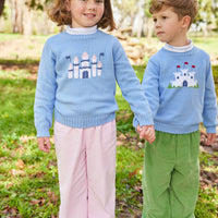 Little English traditional children's clothing. Light blue intarsia sweater with fort motif for little boy for Fall.