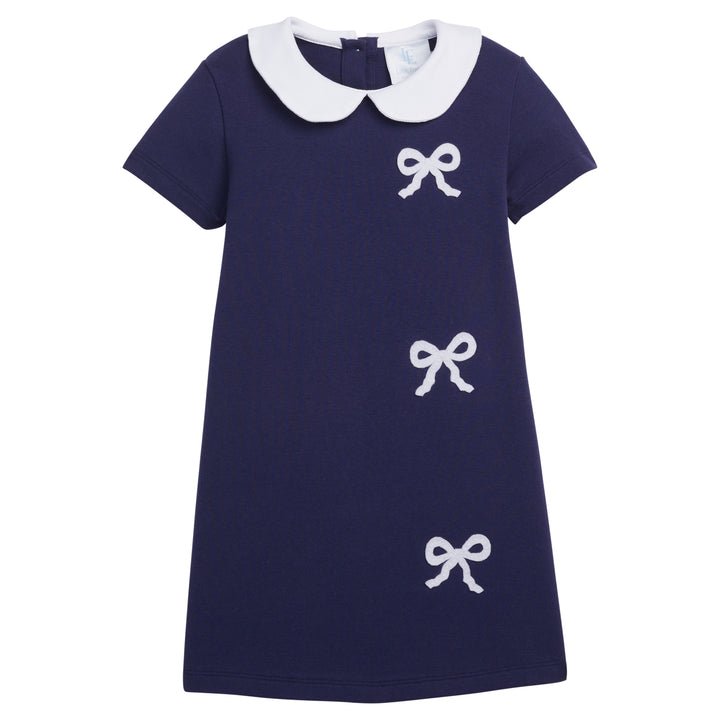 Little English traditional children's clothing.  Navy peter pan dress with white bows for girls for Fall