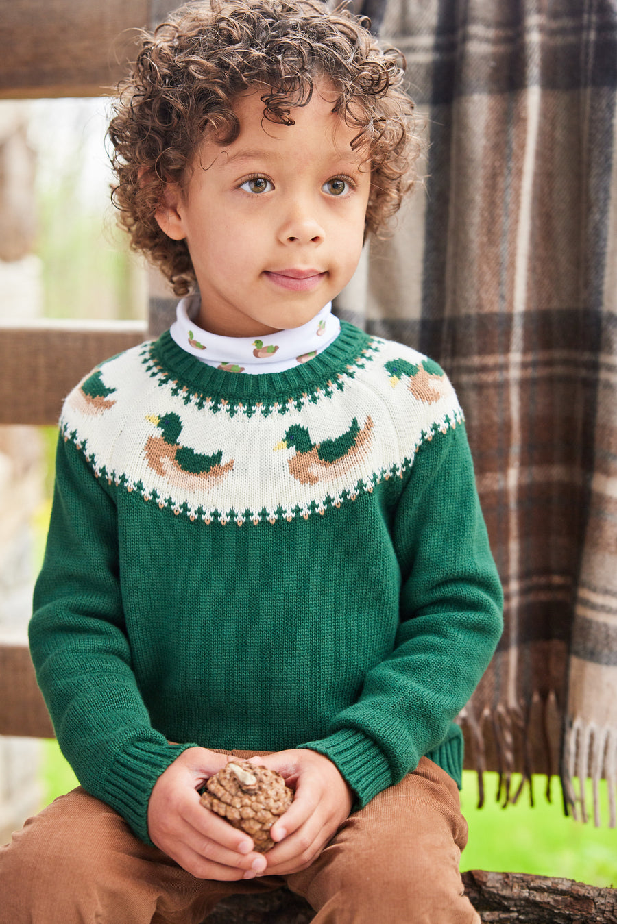 Little English traditional children's clothing. Boy's hunter green fair isle sweater with mallard ducks for Fall