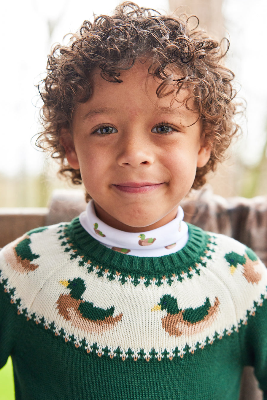 Little English traditional children's clothing. Boy's hunter green fair isle sweater with mallard ducks for Fall