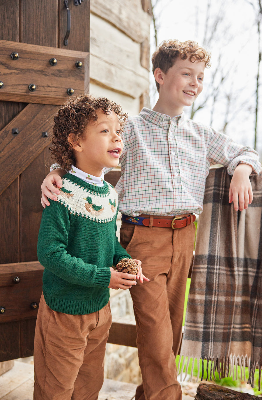 Little English traditional children's clothing. Boy's hunter green fair isle sweater with mallard ducks for Fall