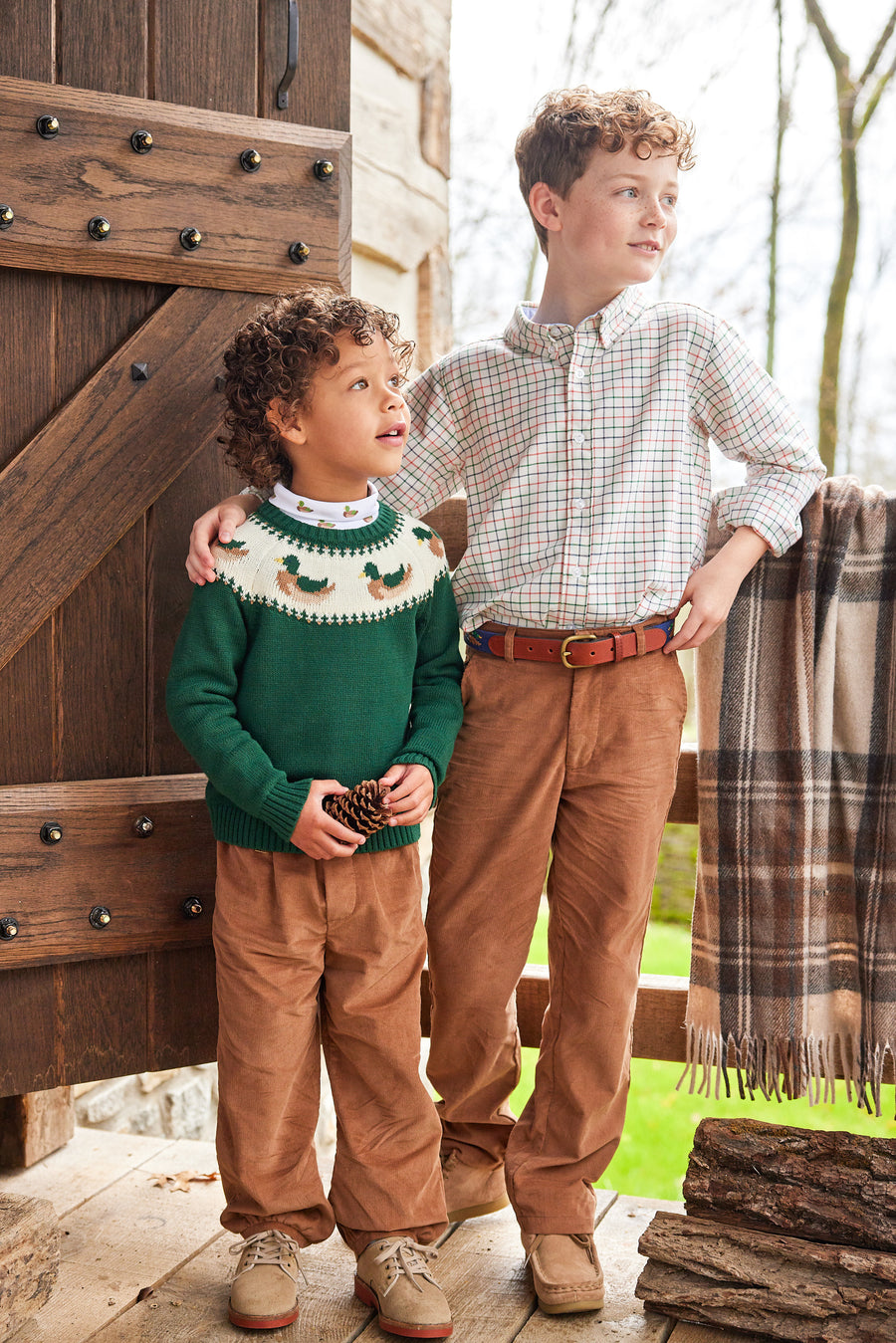 Little English traditional children's clothing. Boy's hunter green fair isle sweater with mallard ducks for Fall