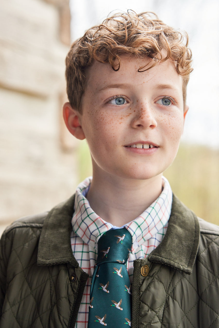 Little English traditional children's clothing.  Boy's hunter green patterned neck tie with mallards for formal occasions.