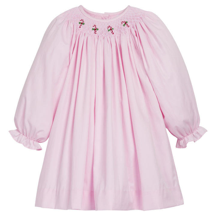 Little English traditional children's clothing. Light pink dress with candy canes for little girls. Fun holiday dress