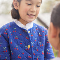 Little English traditional children's clothing.  Blue quilted jacket with cherry print for girls for Fall